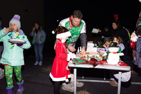 Spartan Waste team enjoying a pizza meal together before the Spartanburg Christmas Parade.